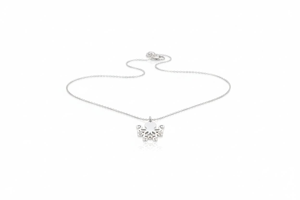 Silver necklace with a butterfly pendant on a white background