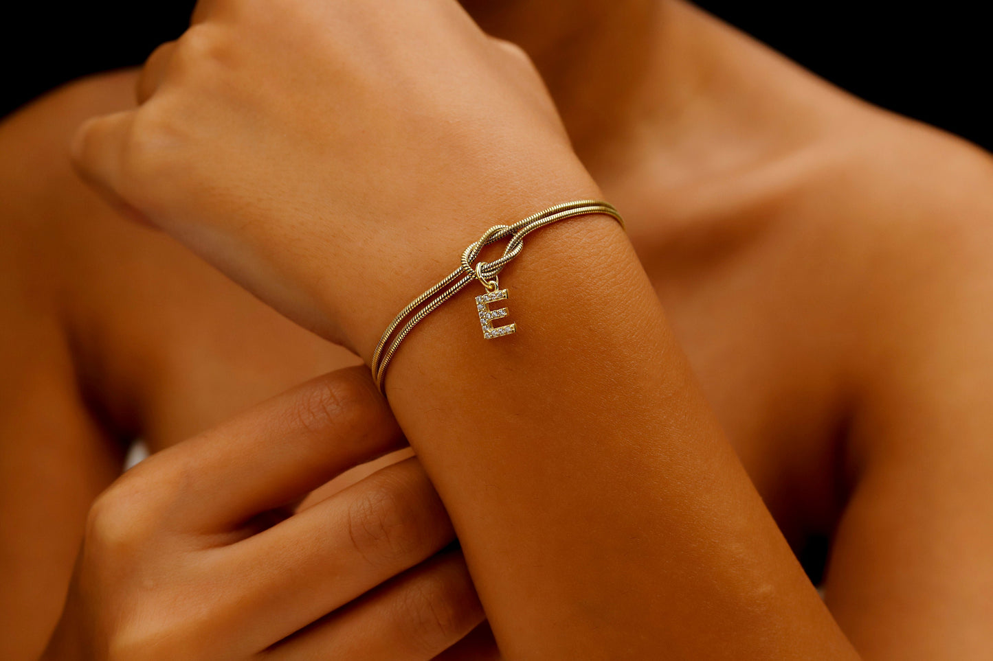 Custom 14K Gold Infinite Love Knot Bracelet with CZ Diamond Letter by NecklaceDreamWorld | Dainty Friendship Bracelets - silvergoldandrose