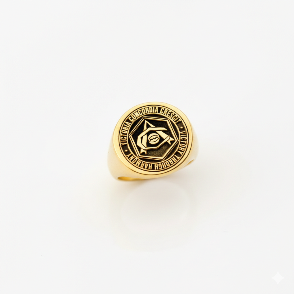 Gold ring with a circular emblem on a white background
