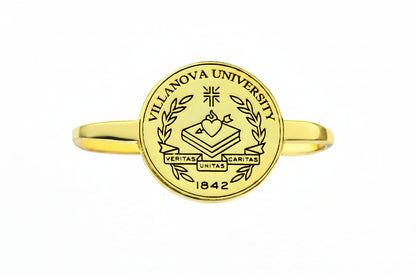 Gold ring with Villanova University emblem on a white background