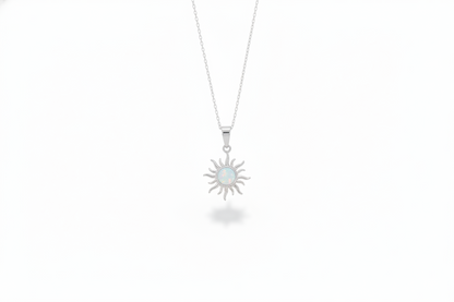 Sun-shaped pendant necklace on a white background