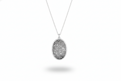 Fingerprint pendant necklace on a white background