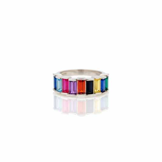 Ring with colorful gemstones on a white background
