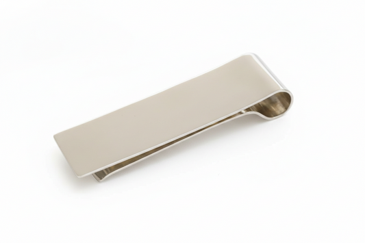 Silver money clip on a white background