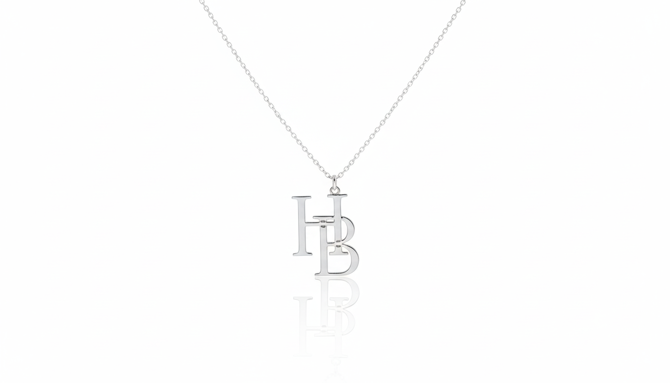 Silver necklace with a pendant on a white background