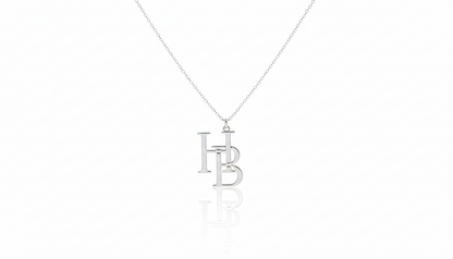 Silver necklace with a pendant on a white background