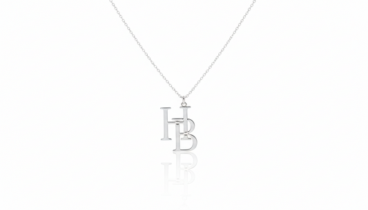 Silver necklace with a pendant on a white background