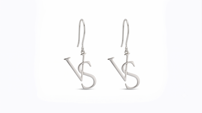 A pair of silver drop earrings featuring a stylized interlocking 'VS' monogram design, suspended from classic fishhook wires on a clean white background.