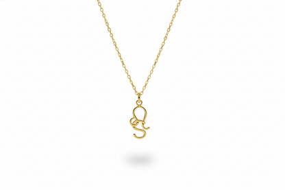 Gold necklace with a small pendant on a white background