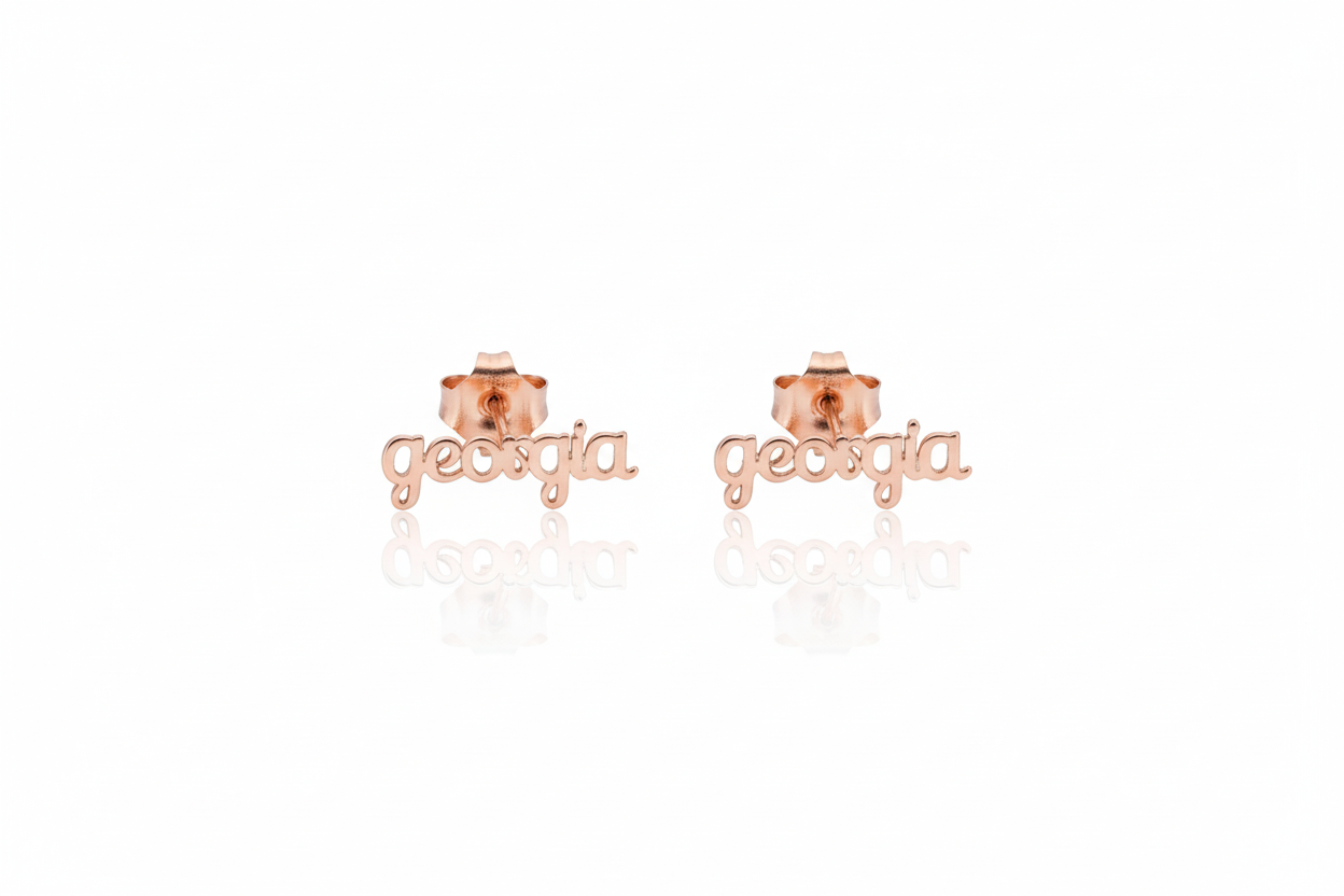 Rose gold 'georgia' earrings on a white background