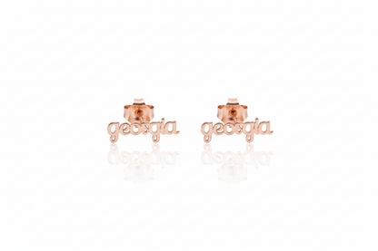 Rose gold 'georgia' earrings on a white background