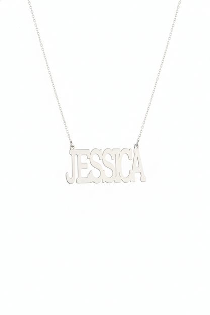 Silver necklace with 'JESSICA' pendant on a white background