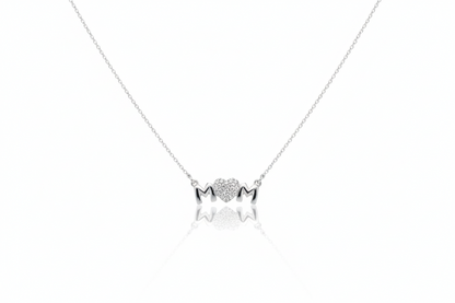 Silver necklace with star and heart pendant on a white background