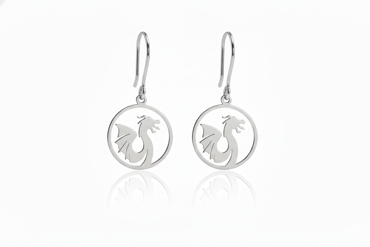 Silver earrings with dragon design on a white background