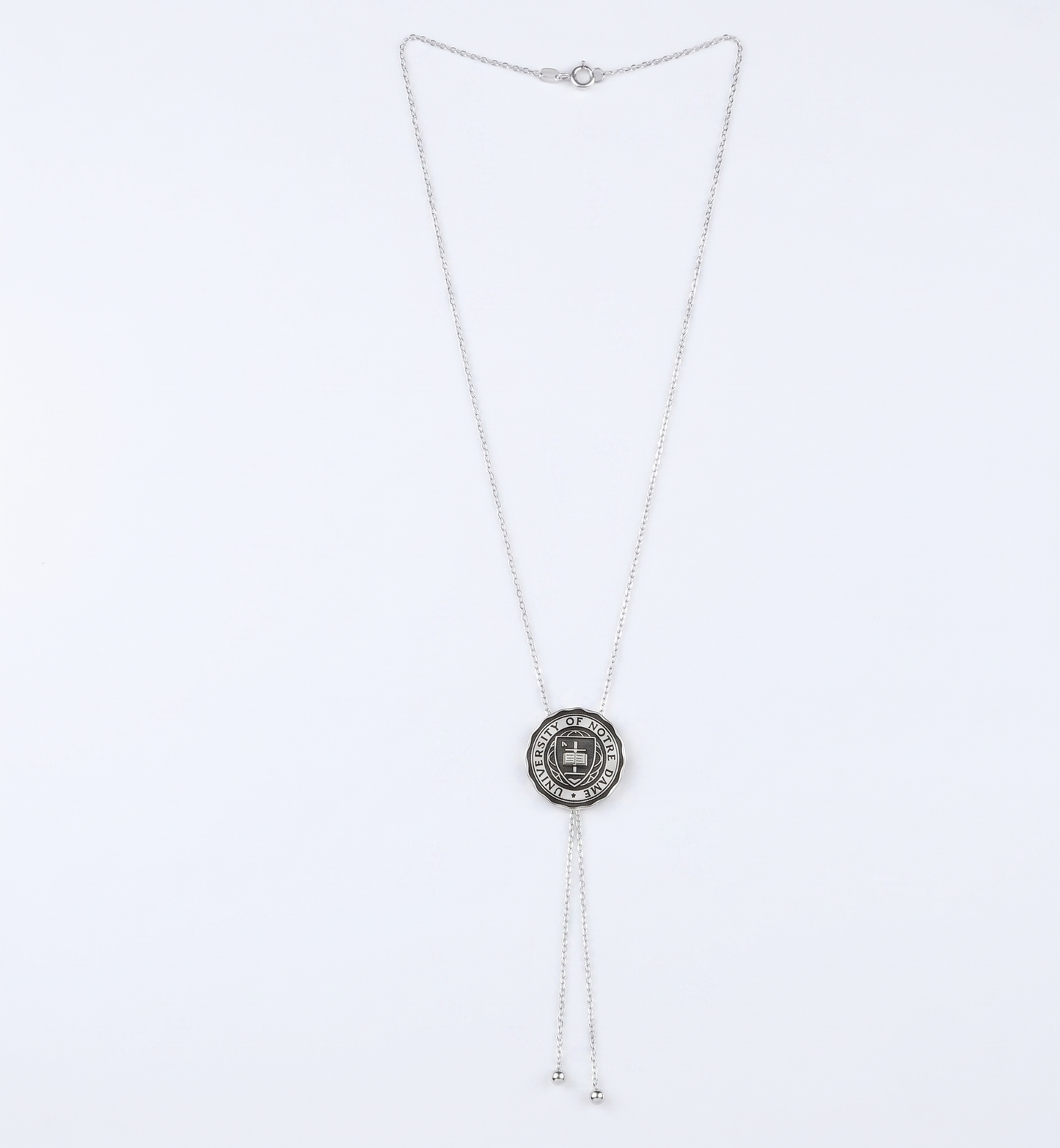 Necklace with a round pendant on a white background