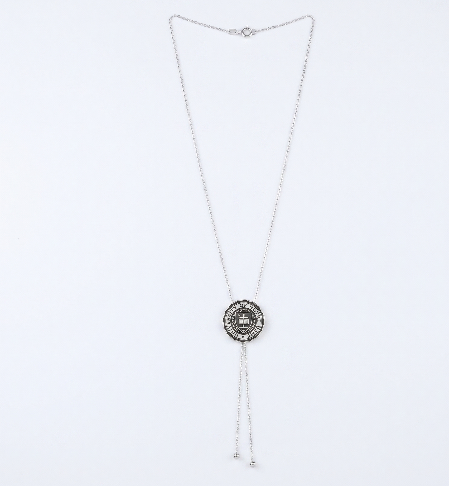 Necklace with a round pendant on a white background