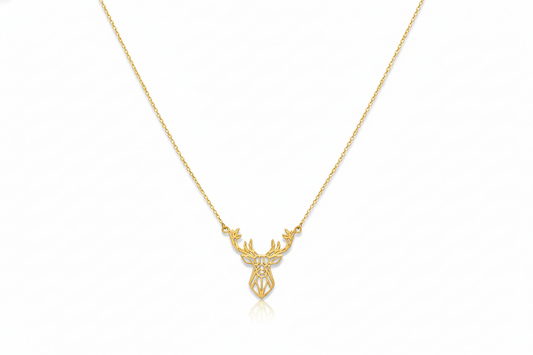 Gold necklace with a deer pendant on a white background