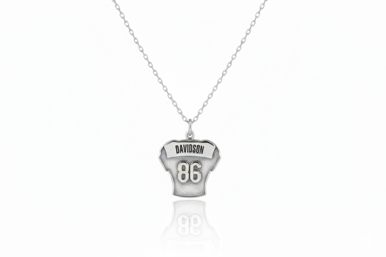 Silver necklace with a pendant on a white background