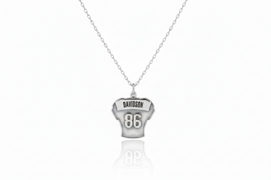 Silver necklace with a pendant on a white background