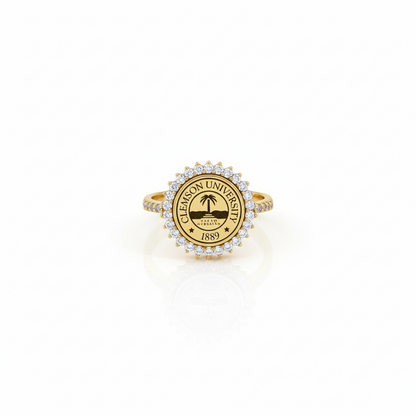 Gold ring with a circular emblem and 'Alabama' text on a white background