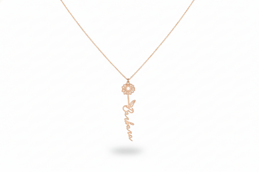 Rose gold necklace with a floral pendant on a white background