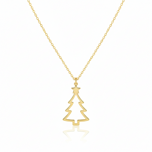 Gold Christmas tree necklace on a white background