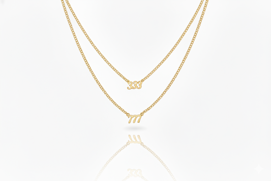 Three gold necklaces with different designs on a white background