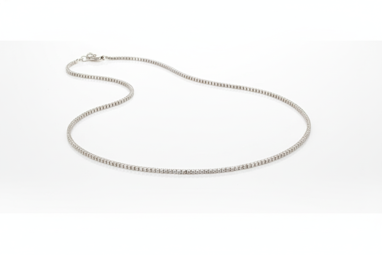 Silver chain necklace on a white background