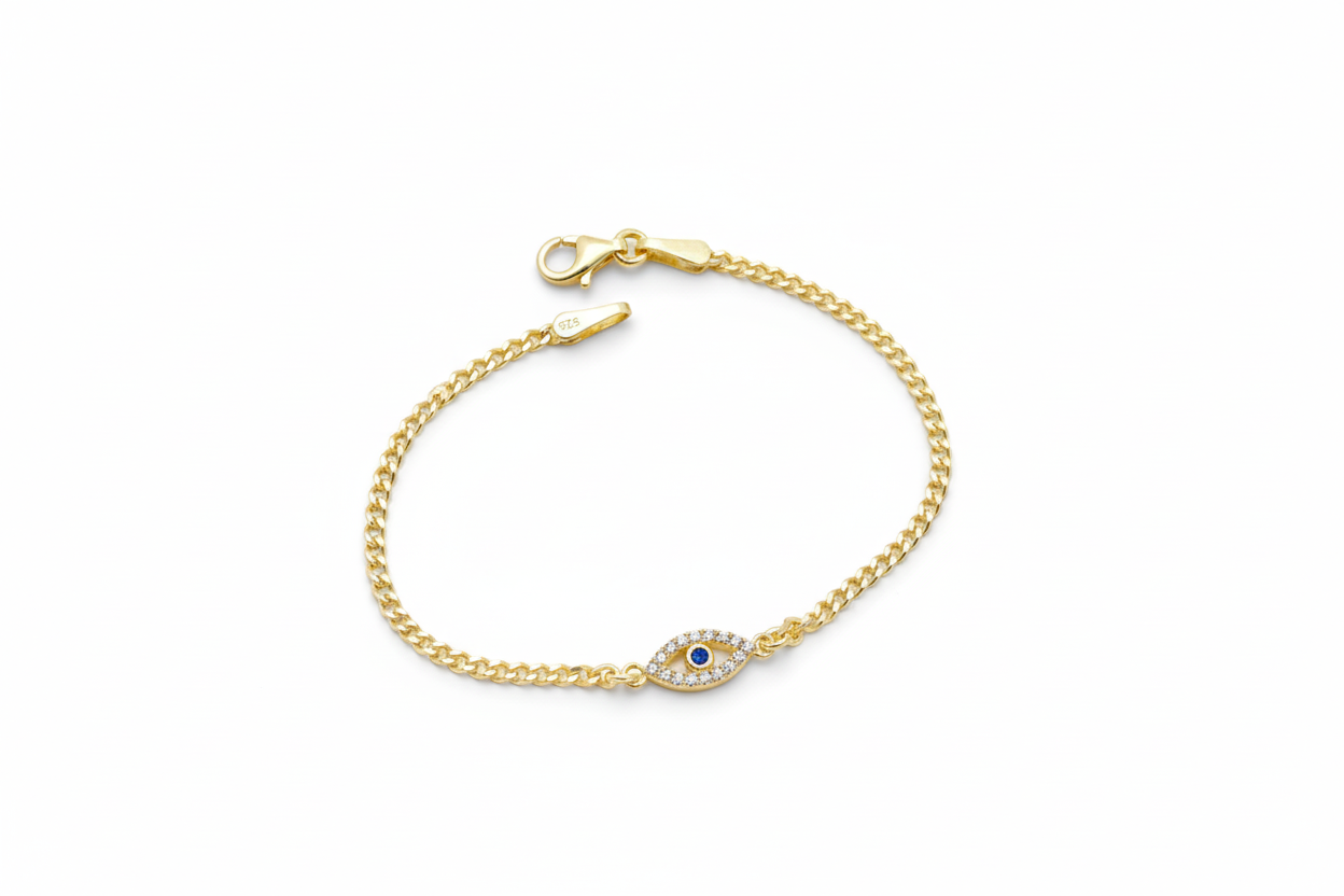 Gold bracelet with a blue gemstone on a white background