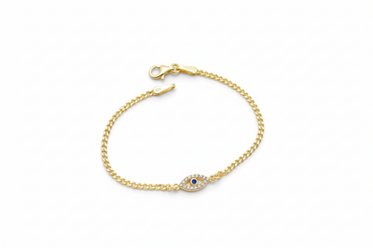 Gold bracelet with a blue gemstone on a white background