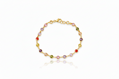Gold bracelet with multicolored beads on a white background