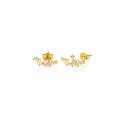 Gold earrings with 'Natalie' inscription on a white background