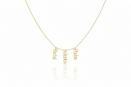 Gold necklace with engraved names on a white background