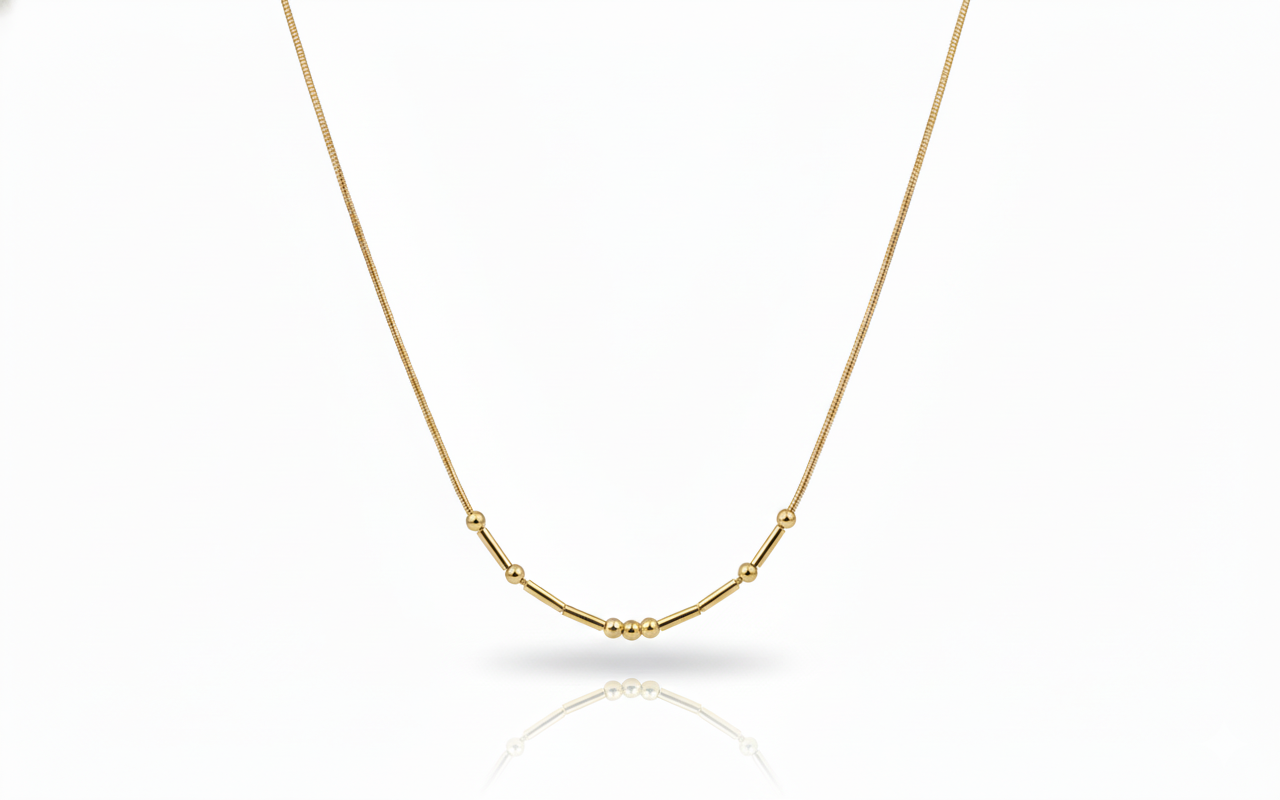 Gold necklace on a white background