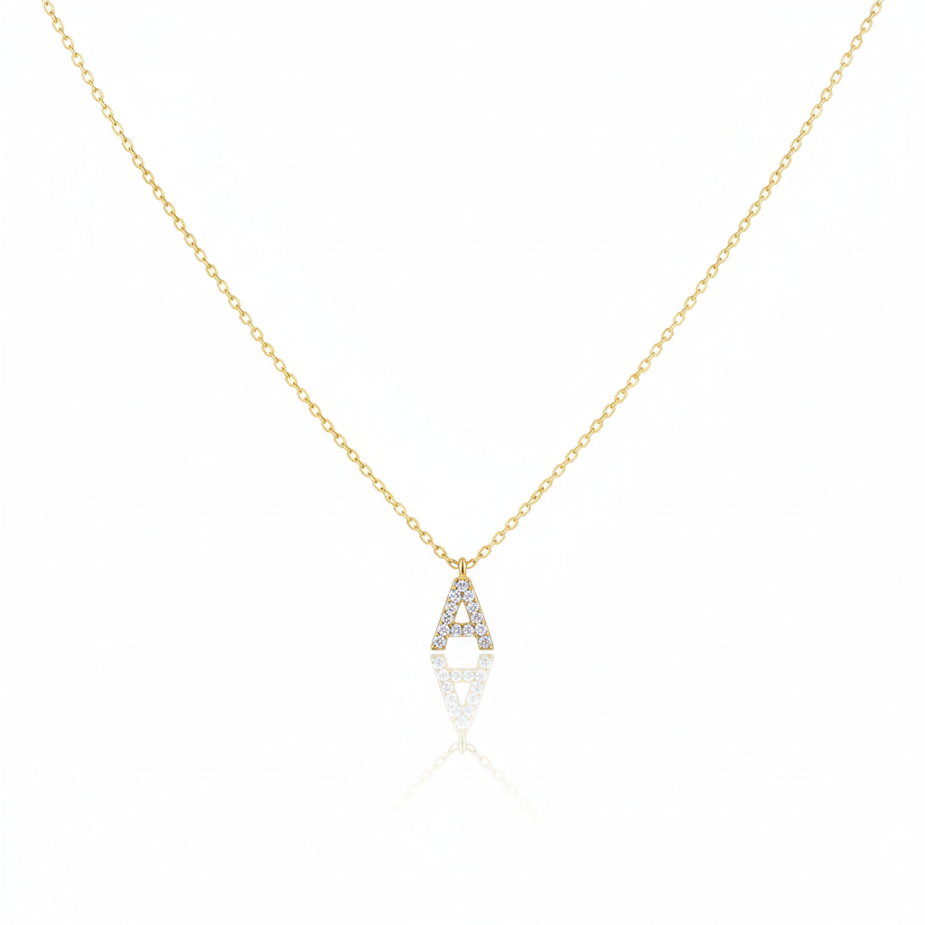 Gold necklace with a diamond pendant on a white background