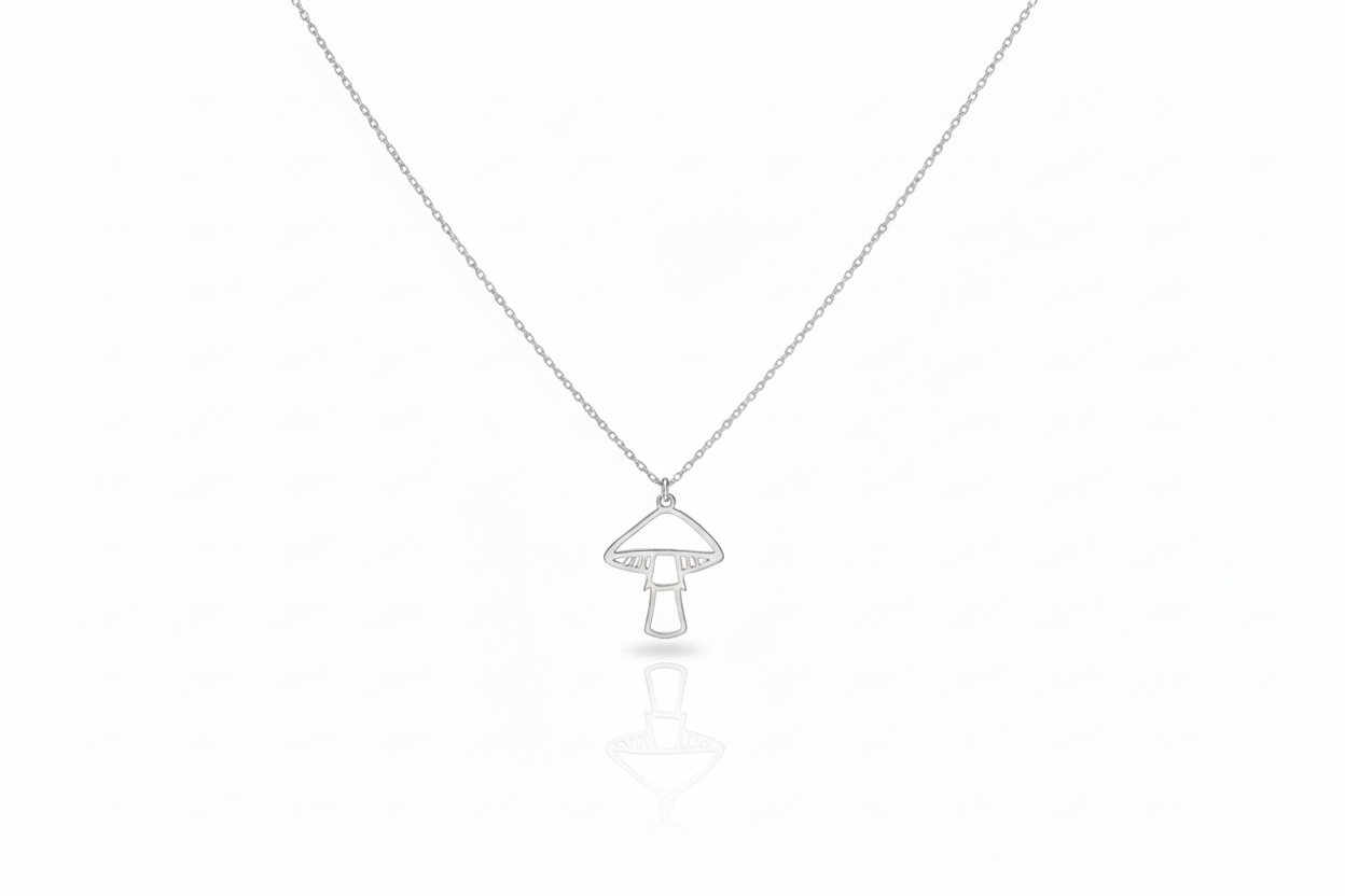 Silver necklace with a mushroom-shaped pendant on a white background