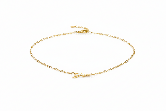 Gold bracelet on a white background