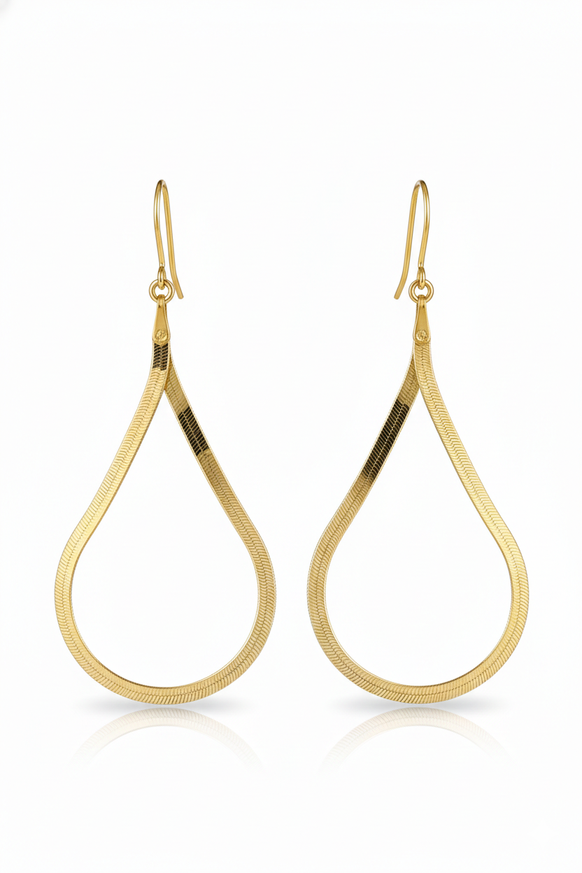 Gold hoop earrings on a white background