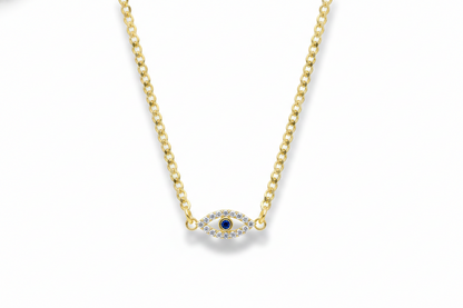 Gold necklace with a small evil eye pendant on a white background