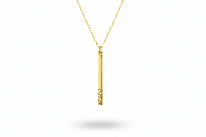 Gold necklace with a vertical pendant on a white background