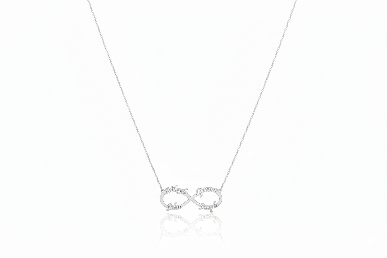 Silver infinity necklace on a white background