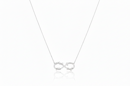 Silver infinity necklace on a white background