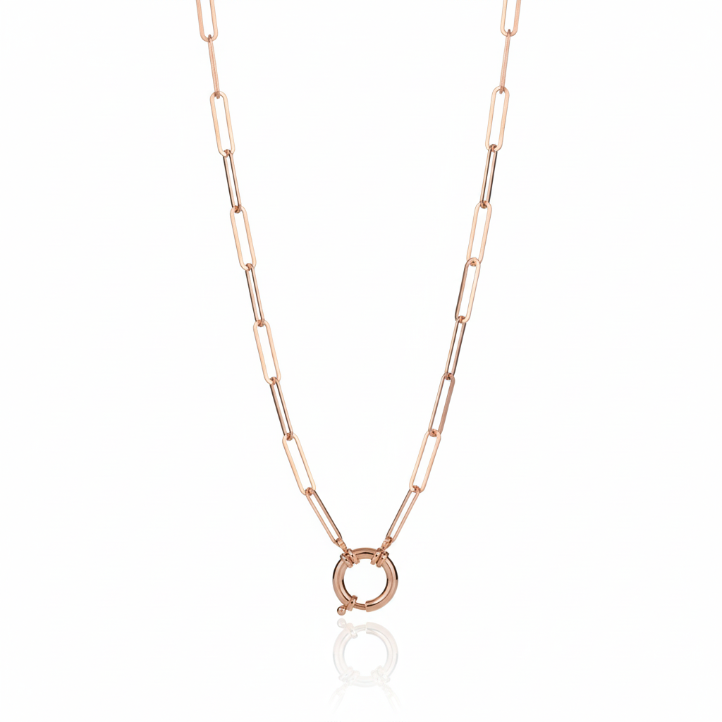 Rose gold chain necklace on a white background