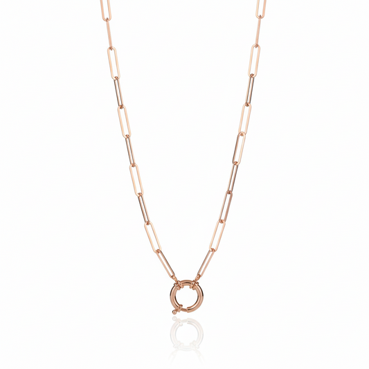 Rose gold chain necklace on a white background