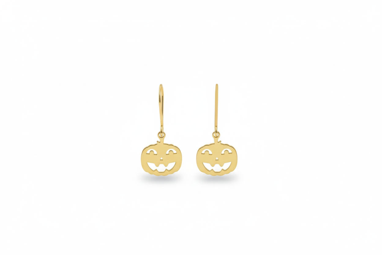 Gold pumpkin-shaped earrings on a white background
