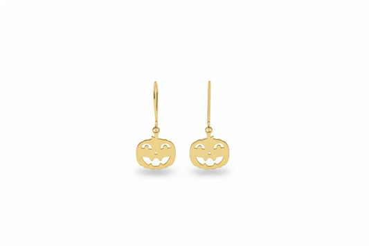 Gold pumpkin-shaped earrings on a white background