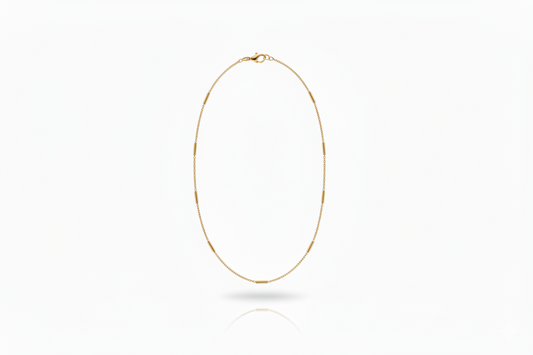 Gold necklace on a white background