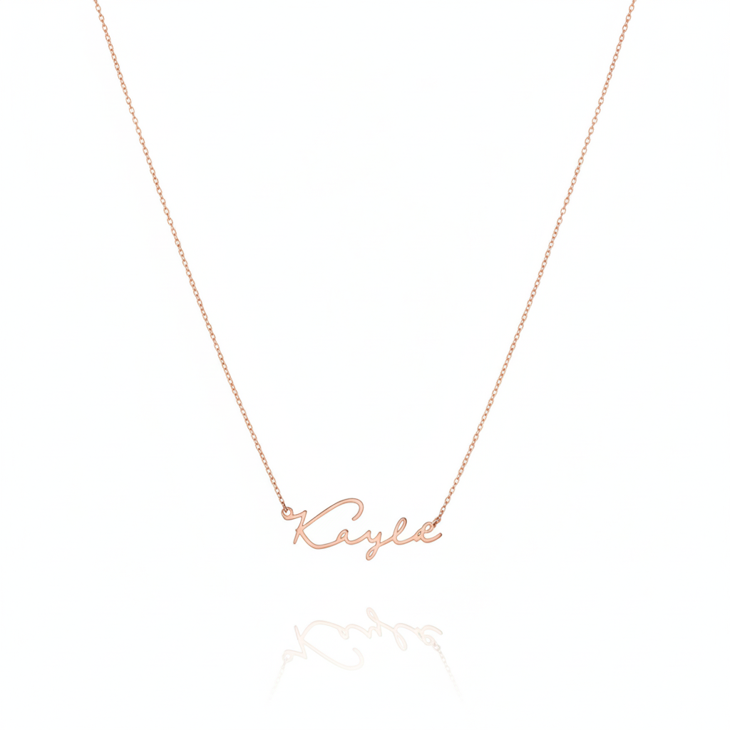 Rose gold necklace with 'Kylie' pendant on a white background