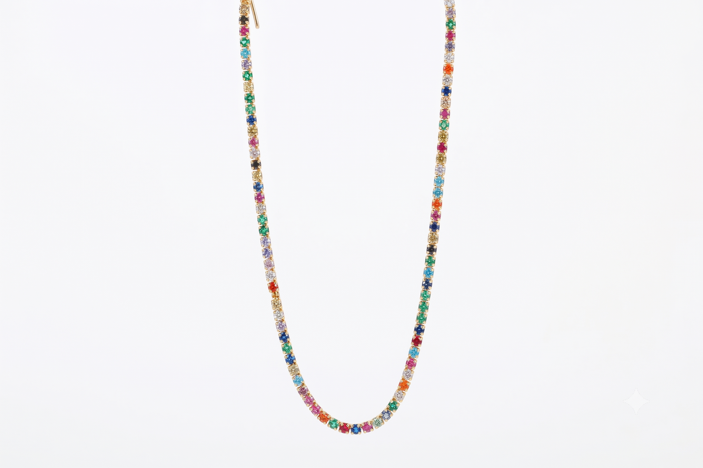 A delicate beaded necklace with small, multicolored faceted beads strung on a fine gold-tone chain, shown against a plain white background.