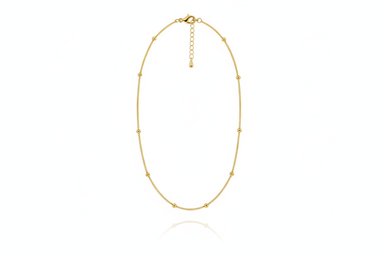 Gold necklace on a white background